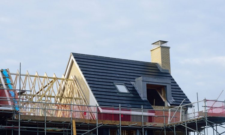 rénovation complète d'une toiture en tuile d'une maison arcachonnaise.